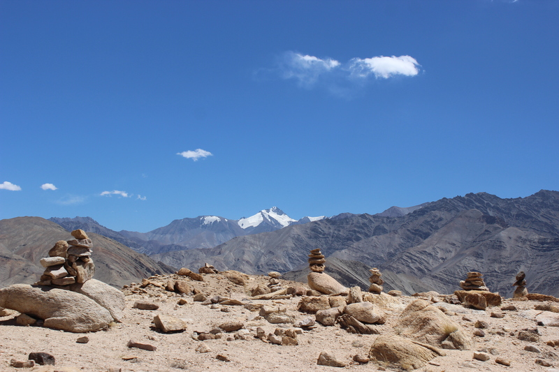 Stone piles on the plateau above Basgo. Stok Kangri in the distance